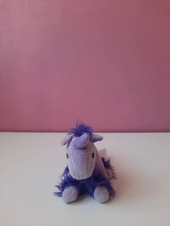 Peluche licorne violette
