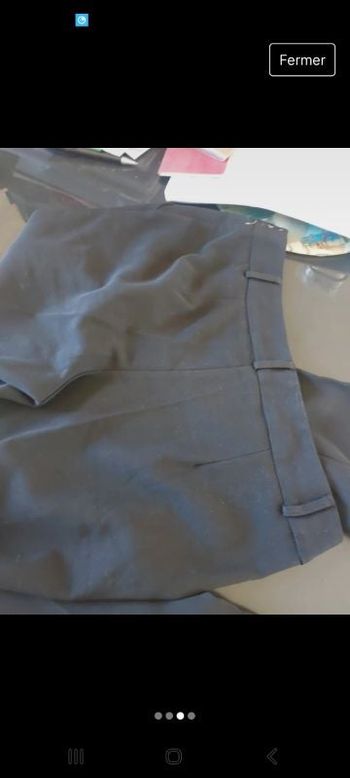 Pantalon noir et doré