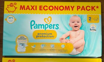 1 carton de couches Pampers  taille 2