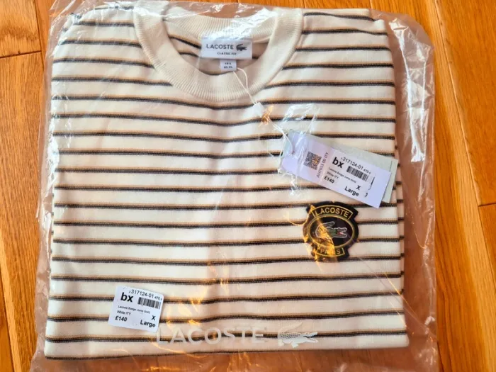 Pull "Lacoste" Blanc à rayures Taille XL neuf sous blister 100 % coton organique.