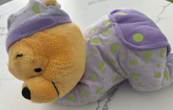Peluche Winnie l’ourson  qui s’illumine dans le noir