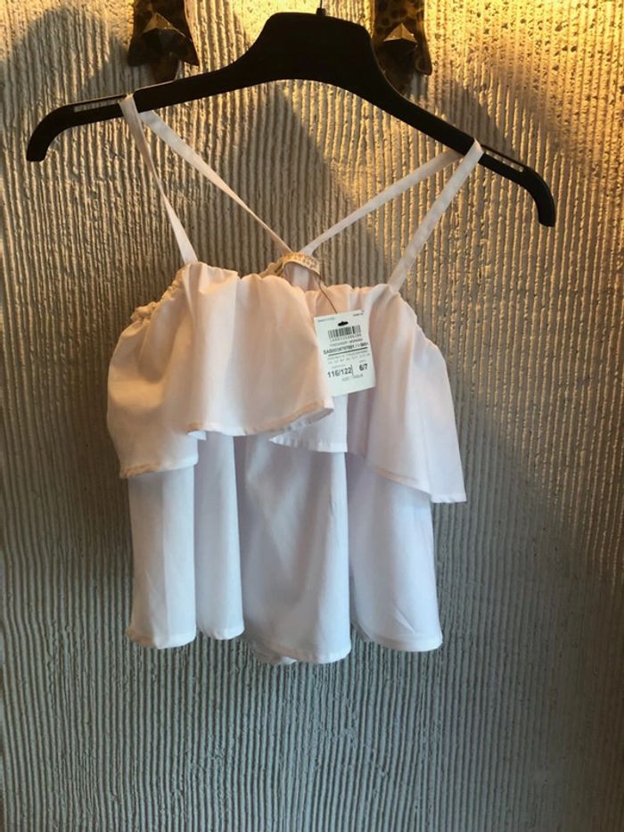 Blouse volantée T 6/7 ans