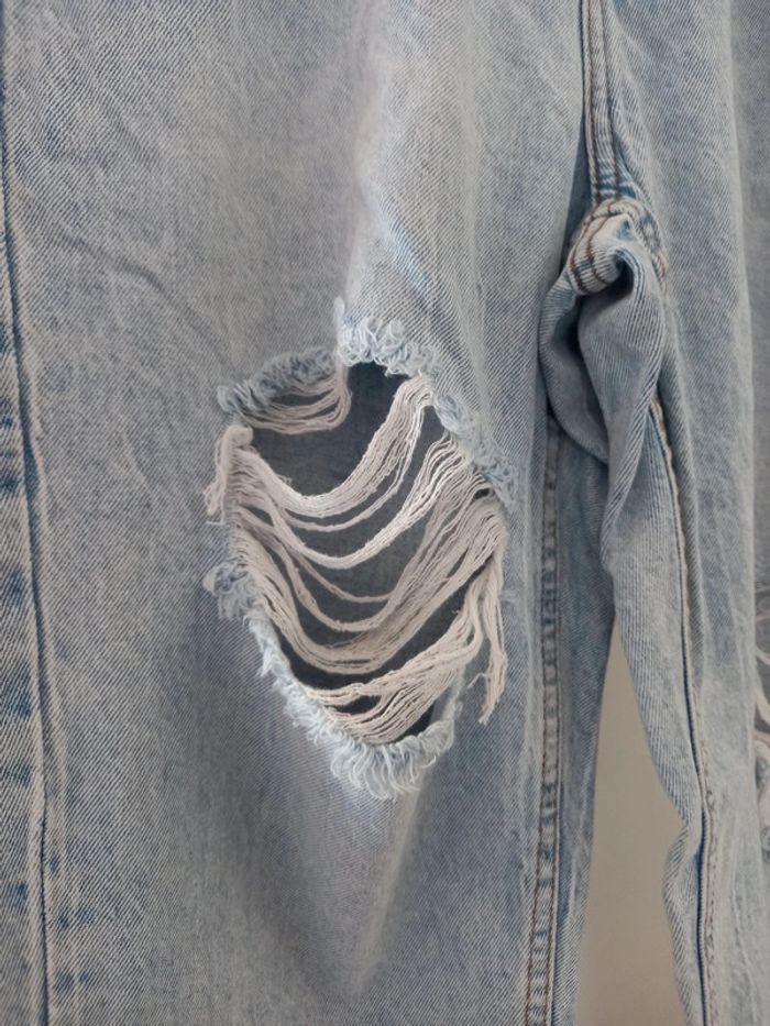 Jeans troué - photo numéro 4