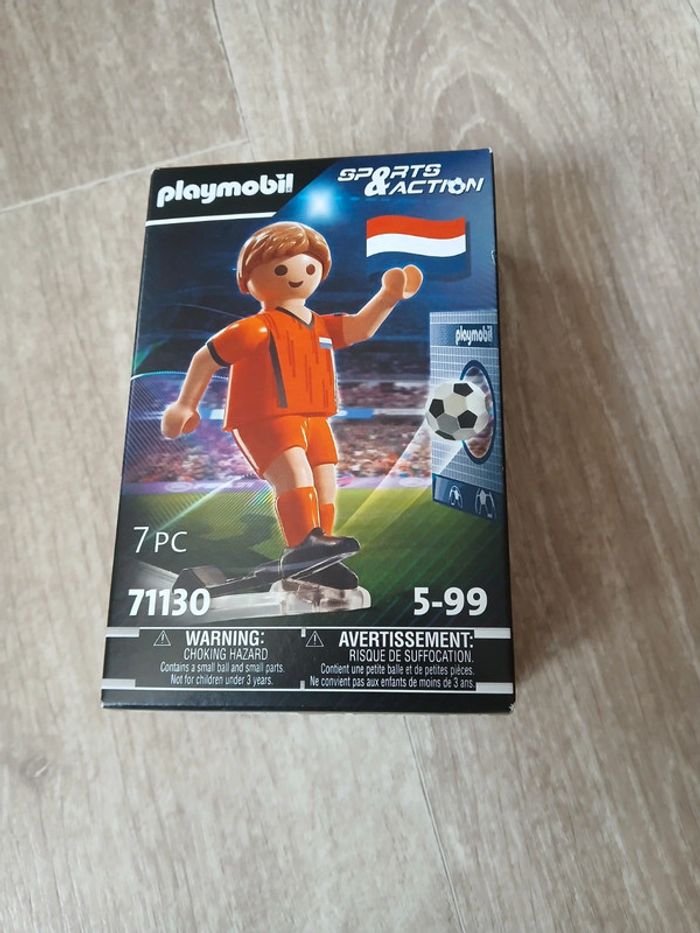 Jouet joueur de foot playmobil neuf