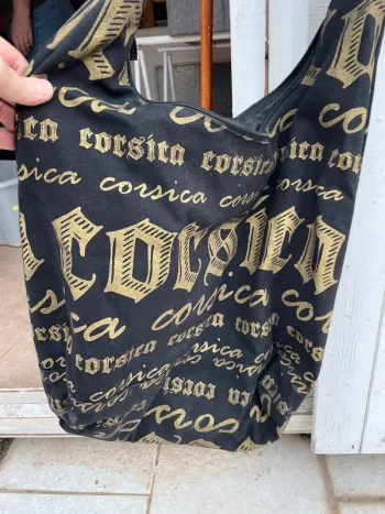 Sac besace noir et or