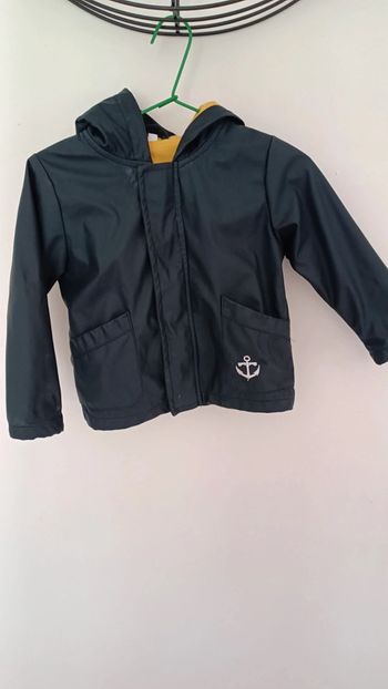 Veste imperméable où ciré bleu marine taille 18 mois