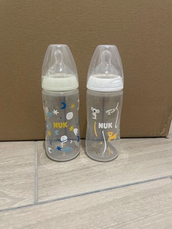 2 biberons nuk