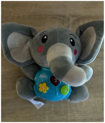 Peluche éléphant musical - en très bon état