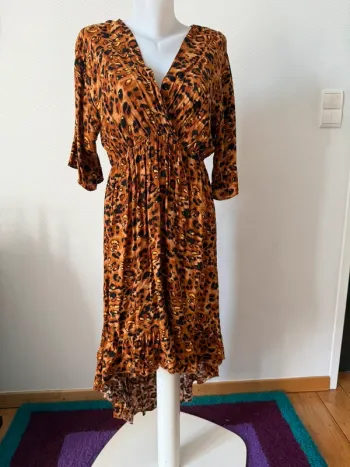 Robe longue léopard en très bon état taille 38 garden