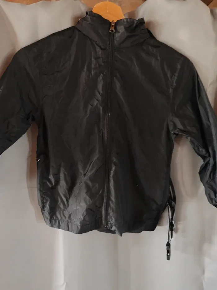 Veste de pluis taille 6 ans