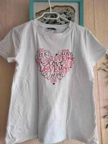 Tee-shirt en très bon état taille 40/42 de chez Shein