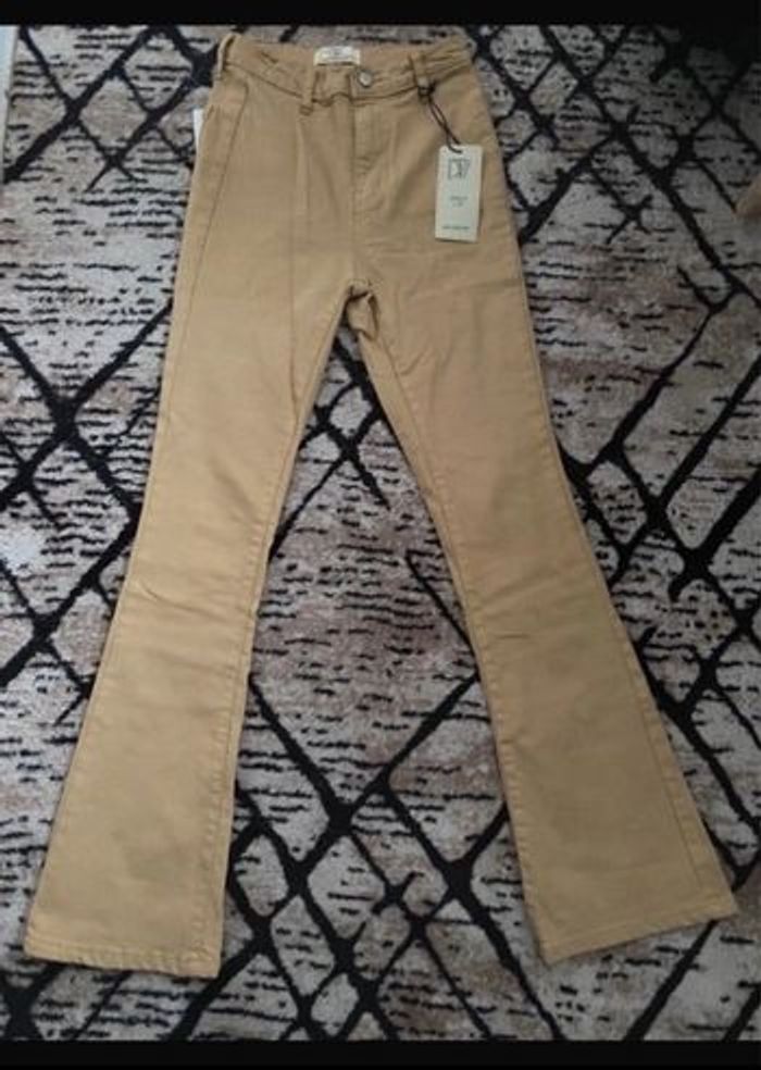 Jean évasé à taille haute taille 34
