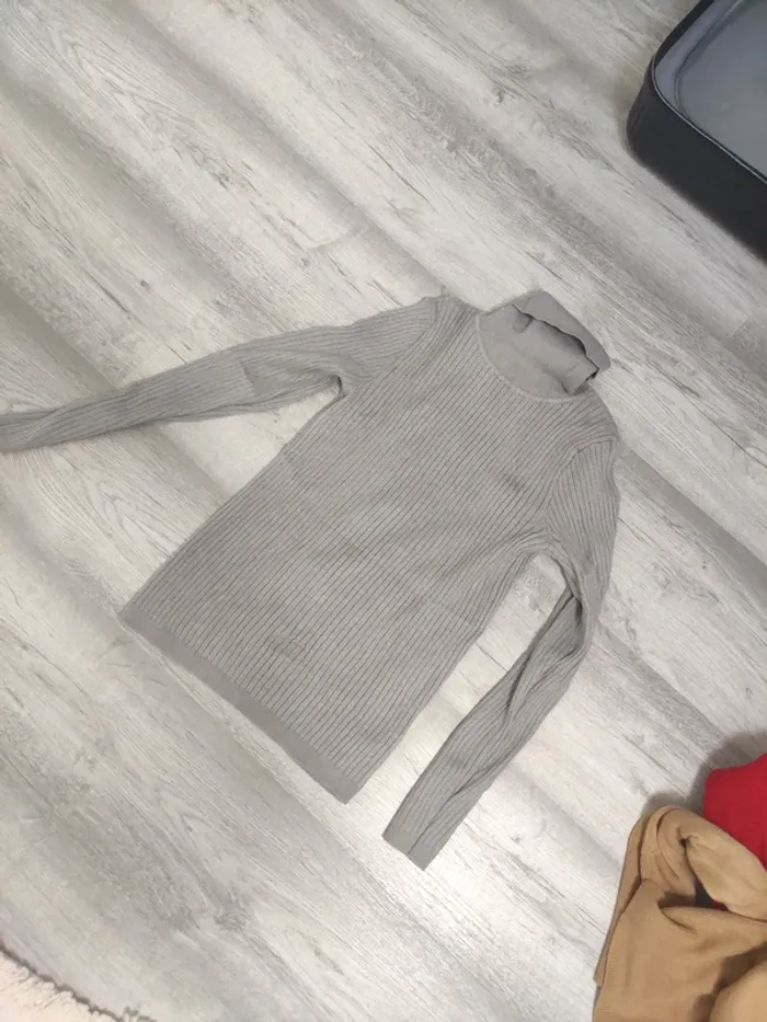 Pull col roulé
