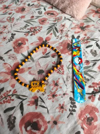 Lot collier tigre bracelet pokémon