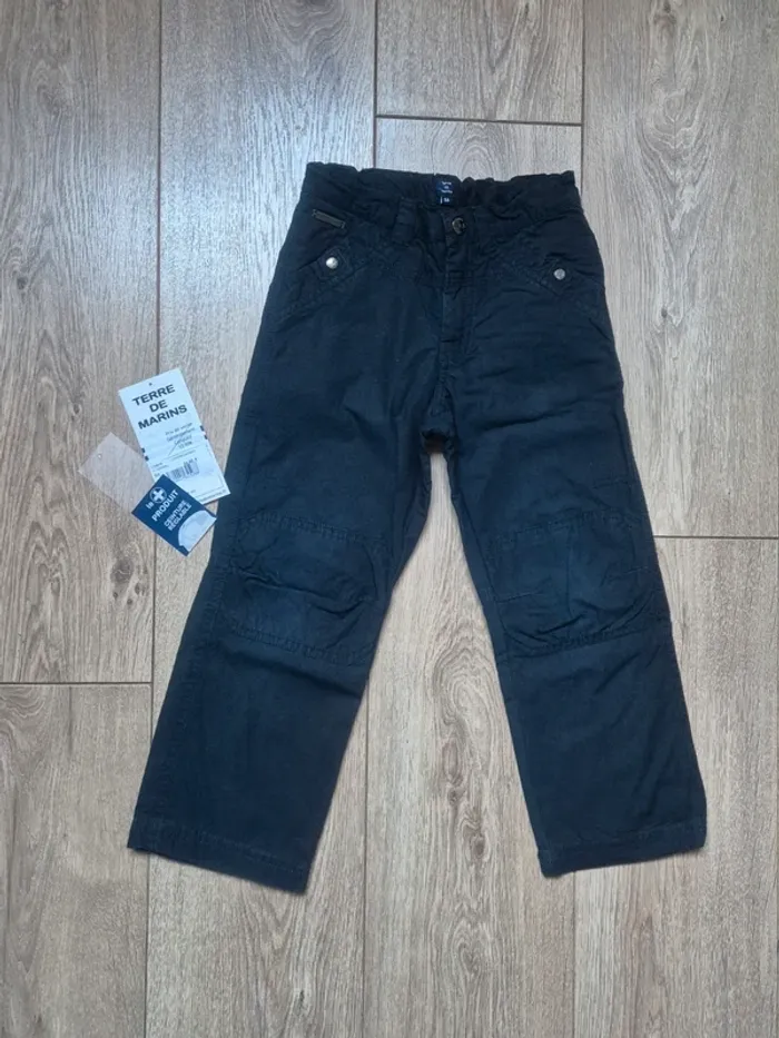 Pantalon doublé "terre de marins" 5 ans bleu marine en très bon état