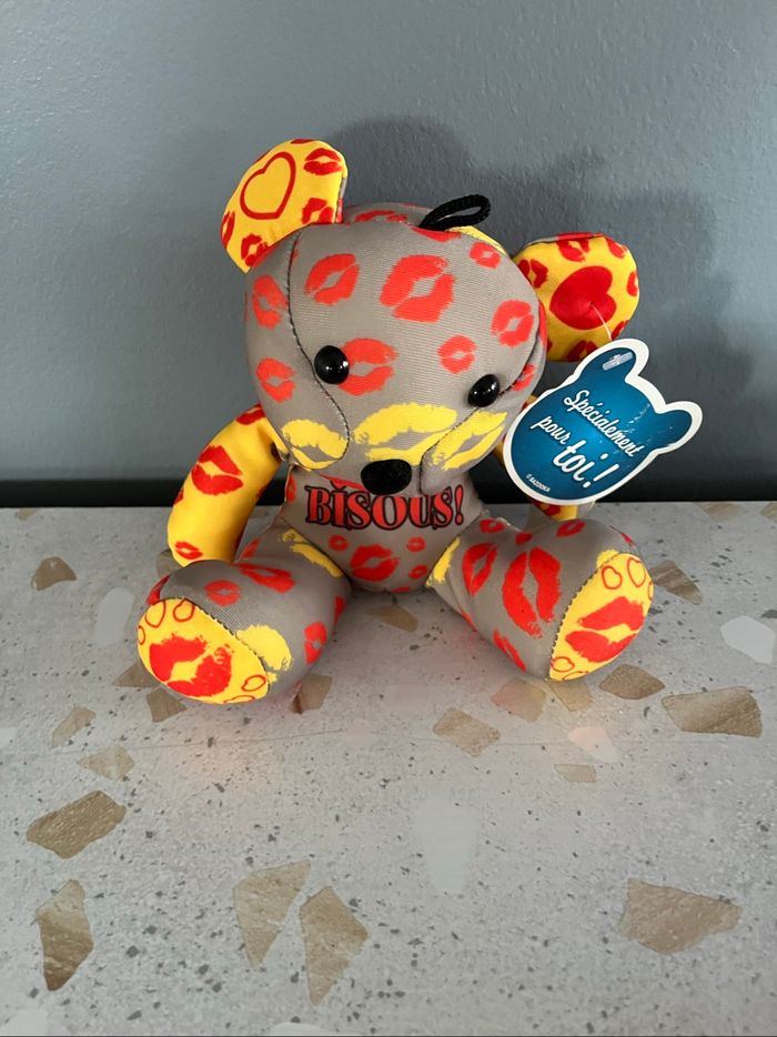 Peluche « billes » bisous neuve