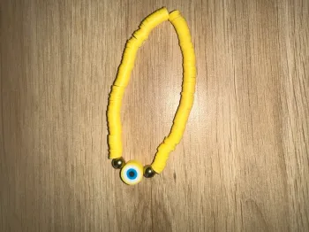 bracelet fushia œil jaune
