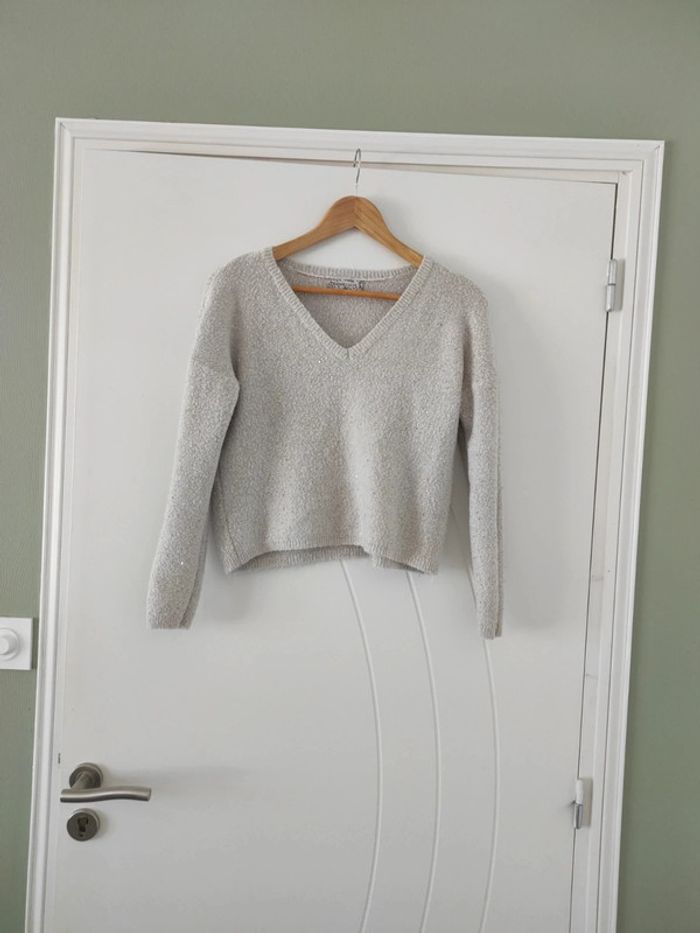 Pull court beige avec strass