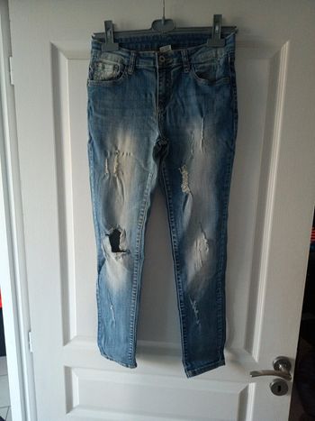 Jeans à trous taille M