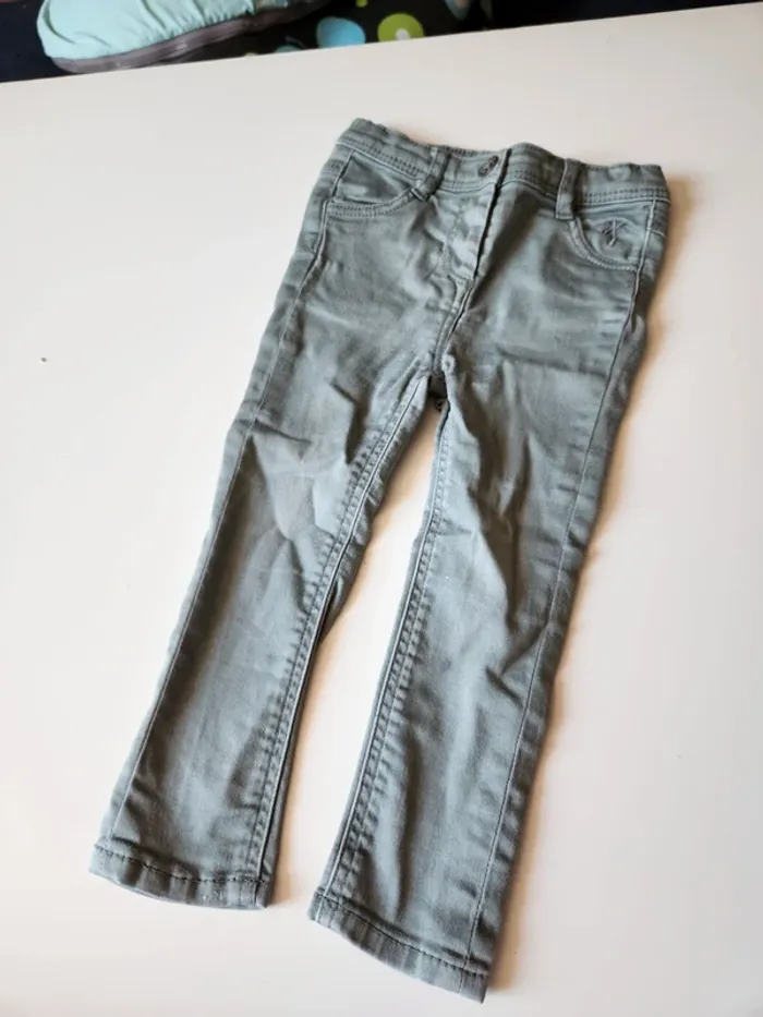 Jeans vert gris tape à l'oeil