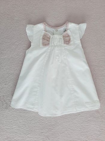 Robe Ikks 6 mois, manches volantées, blanche motif étoiles, gros noeud devant