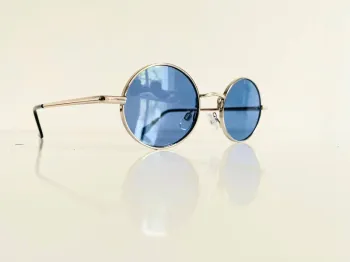 Lunette de soleil ovale mixte argentée verres bleus uvprotection catégorie 2