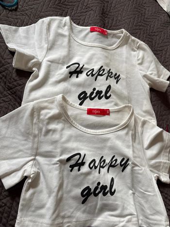 Lot de 2 tee shirt. Happy girl Tissaia en 4/5 ans