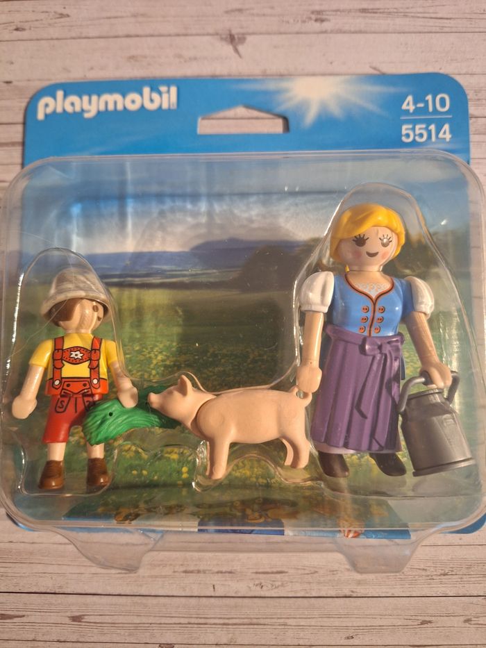 Figurine Playmobil fermière enfant et cochon