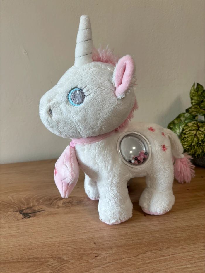 Doudou peluche eveil activité licorne rose blanc tex