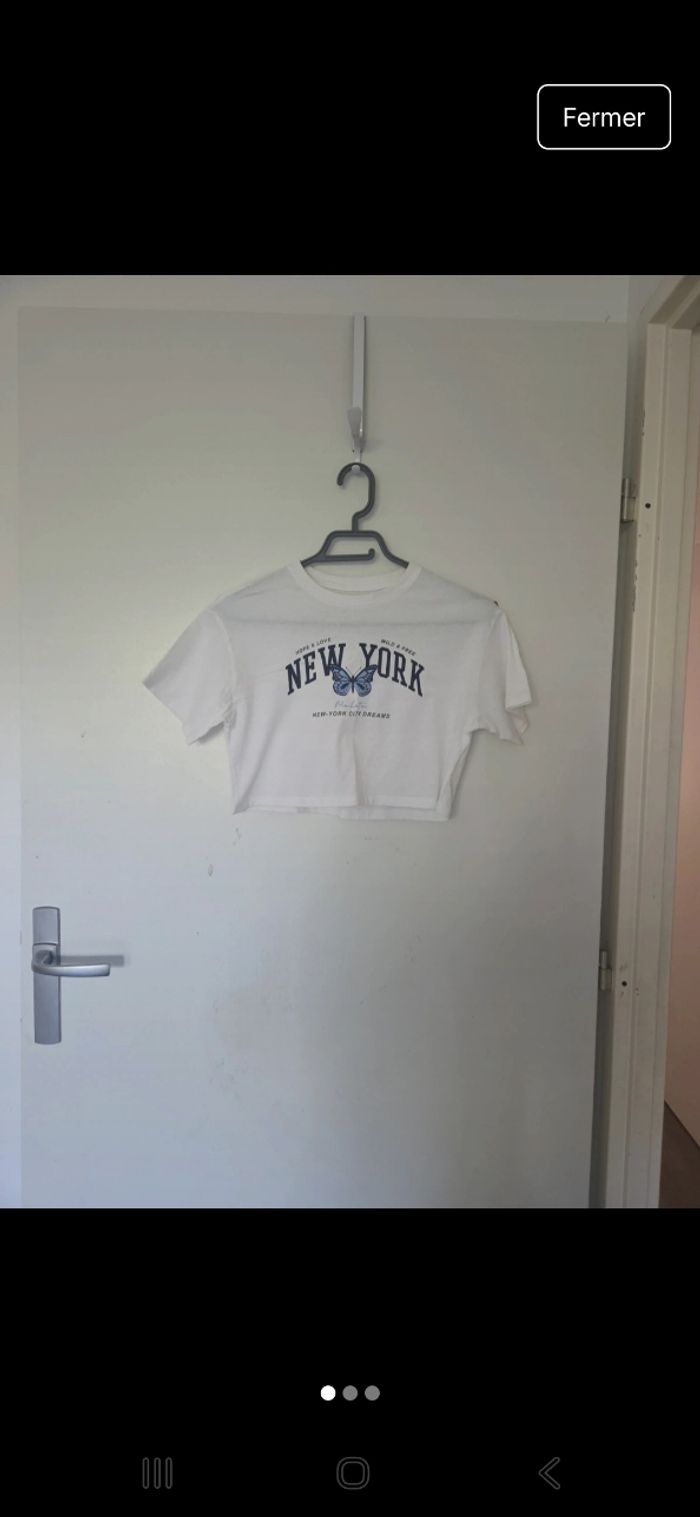 Tee-shirt blanc avec motifs - photo numéro 3