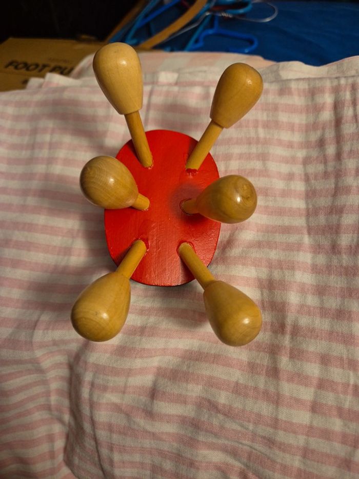 Coccinelle en bois massage de la tête - photo numéro 3