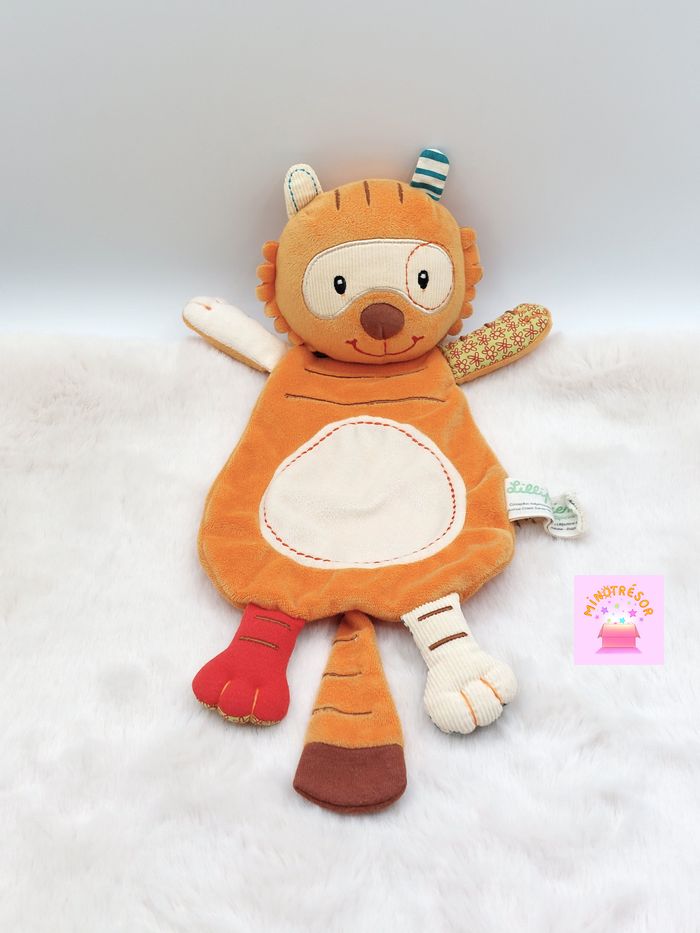 Doudou plat marionnette tigre orange Tom Les Lilliputiens rond écru fleurs rayé