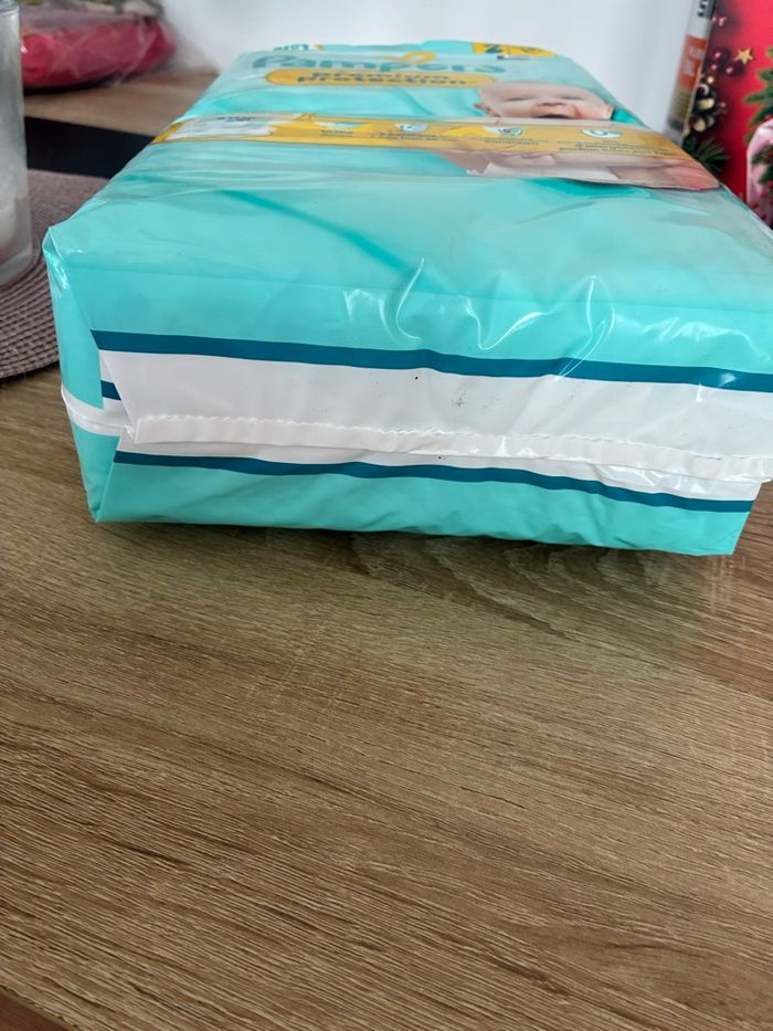 Couche Pampers taille 2 neuve - photo numéro 2