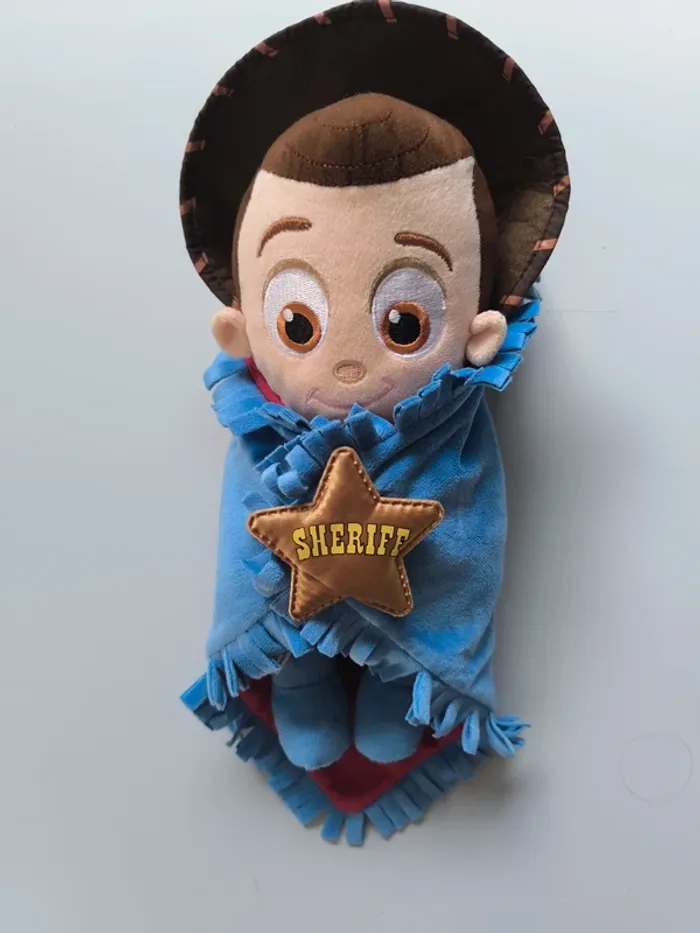 Peluche bébé Woody Disneyland Paris avec couverture