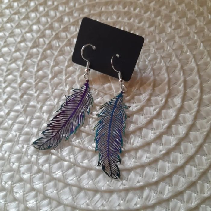 Paire de boucle d oreille plume - photo numéro 3