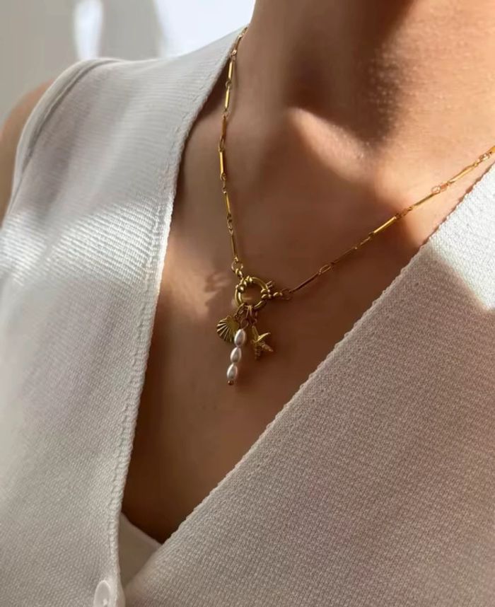 Collier “Trio Marin” en acier inoxydable 316L, pendentifs coquillage, étoile de mer & perle d’eau - photo numéro 2