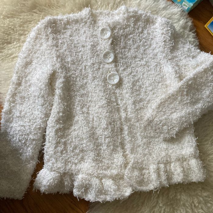 Veste gilet en laine, quatre ans