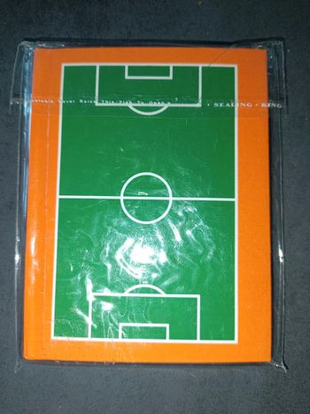 Petit carnet avec couverture terrain de foot