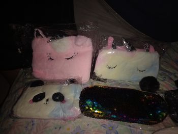 Pochettes poilues ou à sequin prix à l'unité