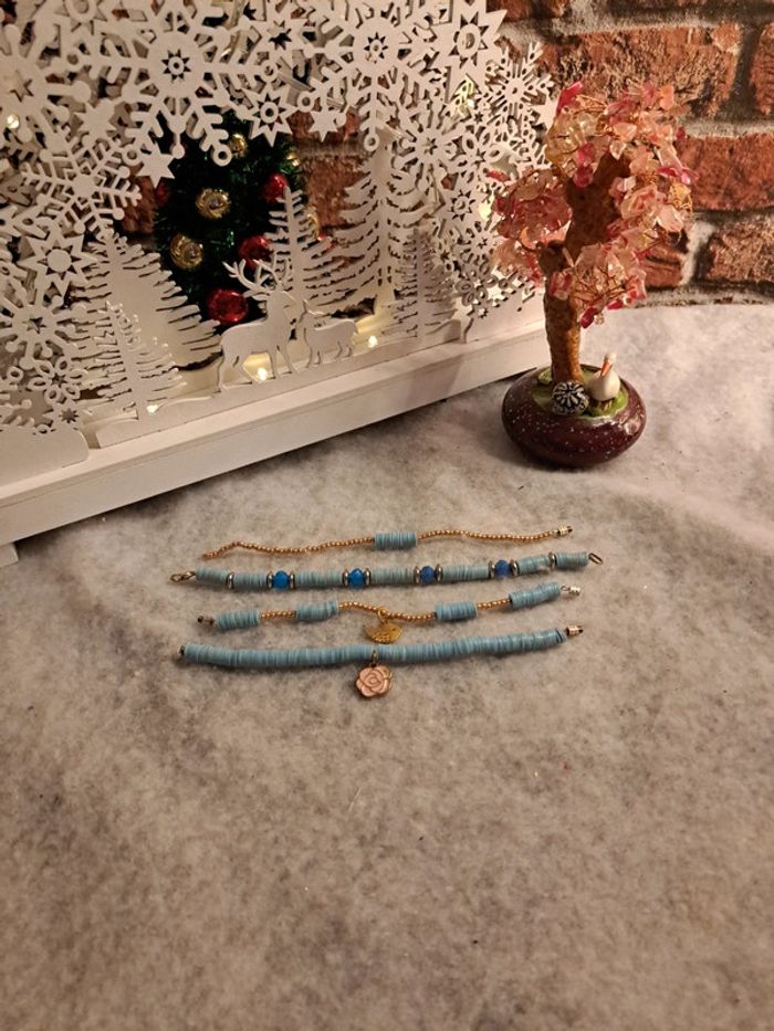 Lot de bracelets bleu et doré heishie