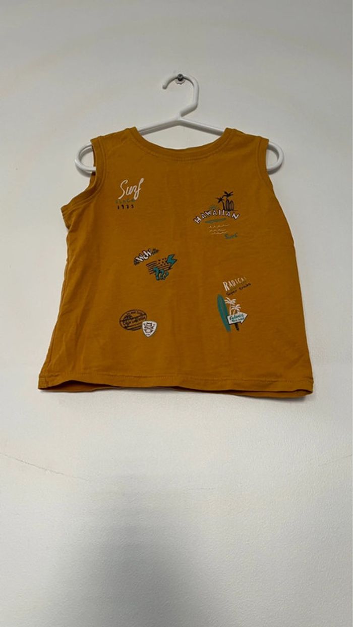 T shirts sans manche in extenso en parfait état taille 4 ans . - photo numéro 4