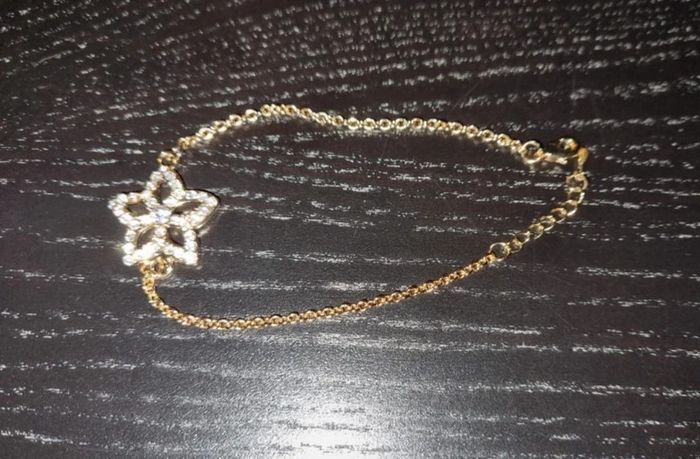 Bracelet fantaisie maille dorée avec fleur - photo numéro 5