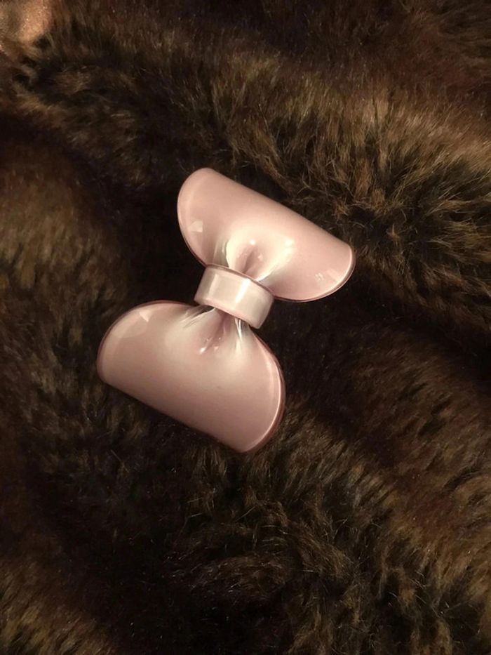 bracelet noeud en plastique vieux rose