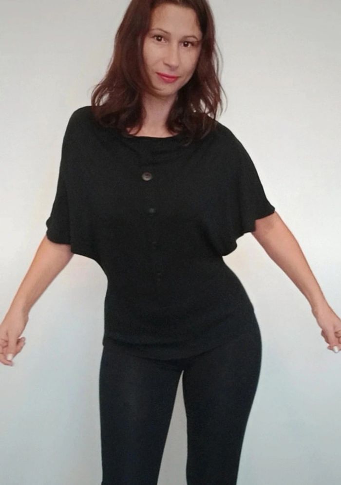 Pull fin noir manches chauve souris TU