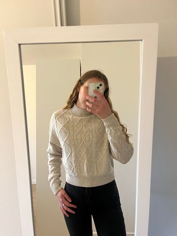 Pull beige col montant