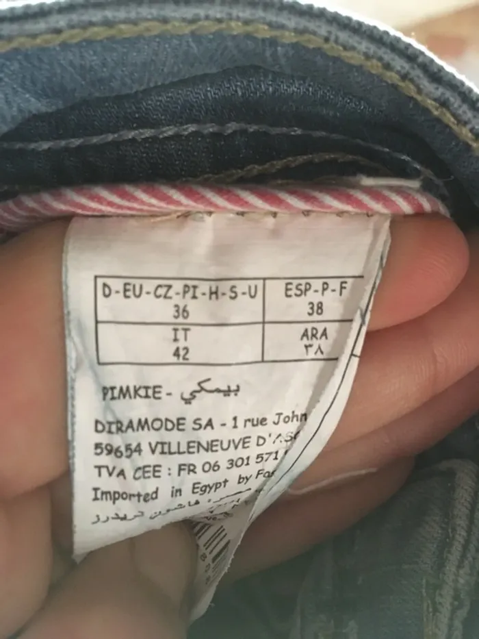 Jeans bleu clair troué @ - photo numéro 4
