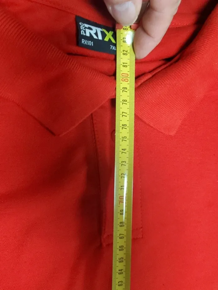 Polo neuf . Grande taille 7xl. - photo numéro 4