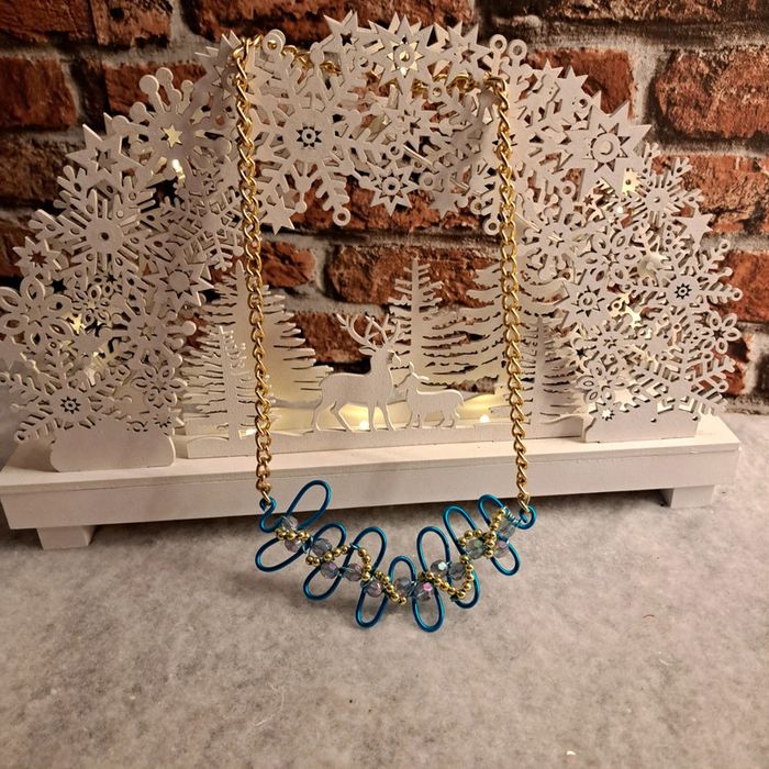 Collier original bleu et doré