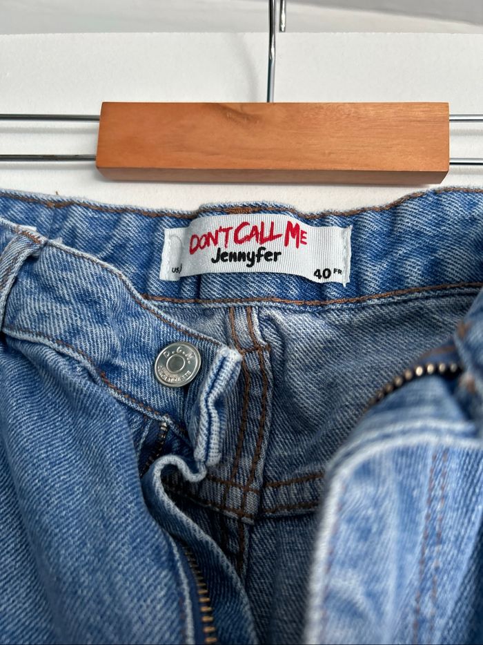 Mom déchiré - photo numéro 2