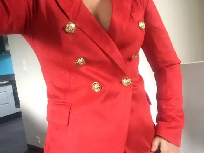 Magnifique veste couleur corail foncé